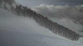 Ski slopes on North slope Aibga Ridge of Western Caucasus at all-season resort Gorky Gorod stock footage video