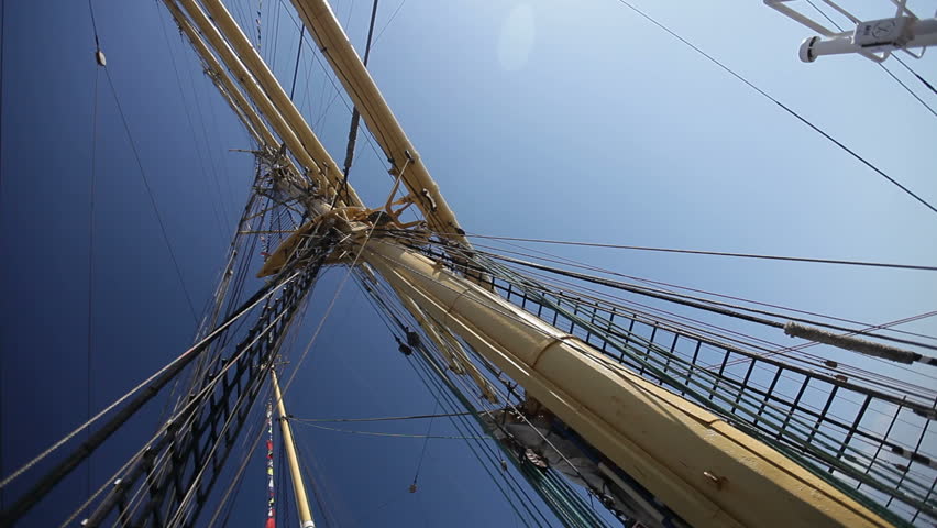Main mast and shrouds of a tall sailing ship against clear blue sky. | Shutterstock HD Video #25368647
