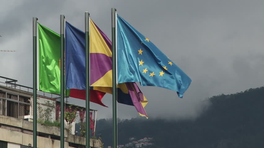 2010-November Madeira. The EU, Portuguese and Madeiran Flags flying in Funchal