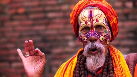 Portrait of sadhu (religious ascetic or holy person) in the Pashupatinath temple complex that is on UNESCO World Heritage Sites's list Since 1979. Kathmandu, Nepal.