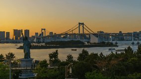 4K Day to Night timelapse zoom in and pan up 
video of rainbow bridge at twilight, Tokyo, Japan 