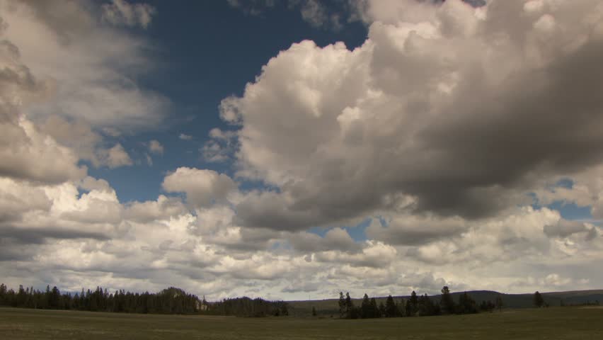 Large meadow with dramatic clouds 