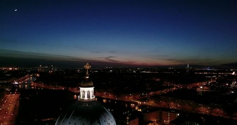 Night aerial shot from above of Trinity Cathedral (Troitsky Cathedral) in Saint Petersburg, Russia. Vertical panoramic view from top to down on the beautiful night cityscape background