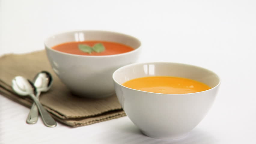 Ladling soup into bowl
