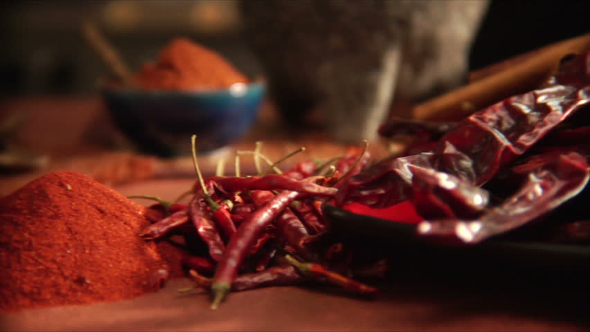pouring mexican spices