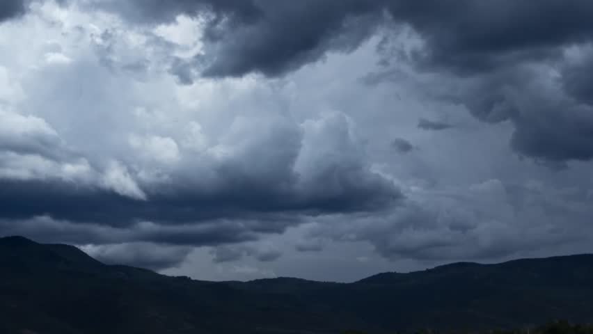 A timelapse of large storm clouds moving through the valley