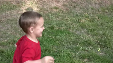 Kid running and giggling, being chased.  Sound: Yes.  HD 1080i