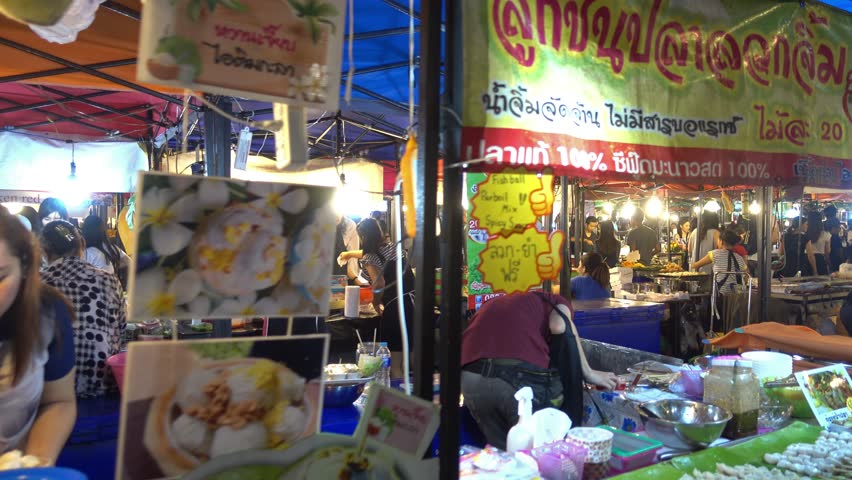 BANGKOK, THAILAND - CIRCA JAN 2017: Walking on Night Market at Talad Rod Fai, Ratchada in Bangkok