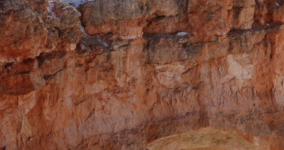 BRYCE CANYON, UTAH - 24 MAR 2017: Bryce Canyon arch tilt down winter spring snow. Geological formation weather water erosion. Nature ecological sensitive landscape and tourist destination.