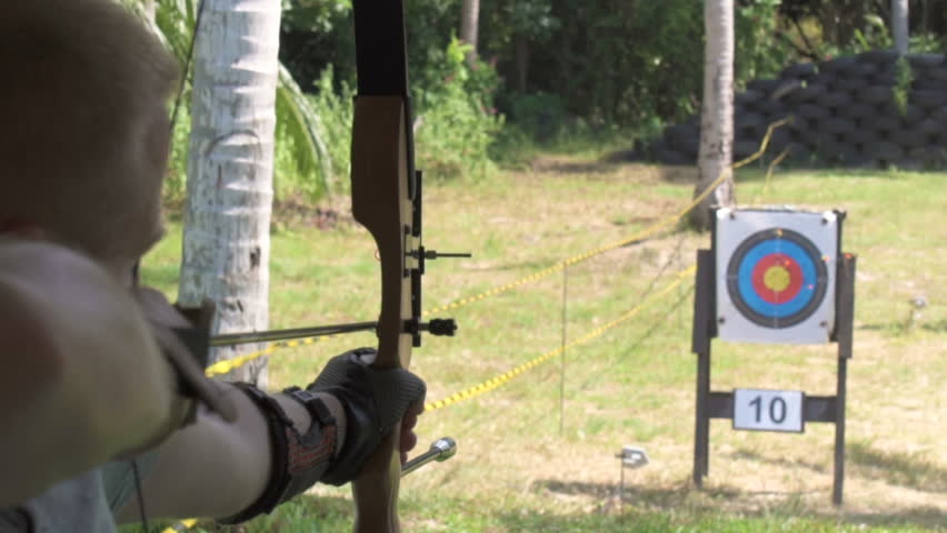 Man Shooting at Archery, Slow motion