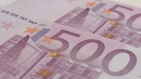 Slow tilt on 500 euro banknotes background 4K 2160p 30fps UltraHD footage - Close-up of EU paper money in five hundred denominations 3840X2160 UHD tilting video