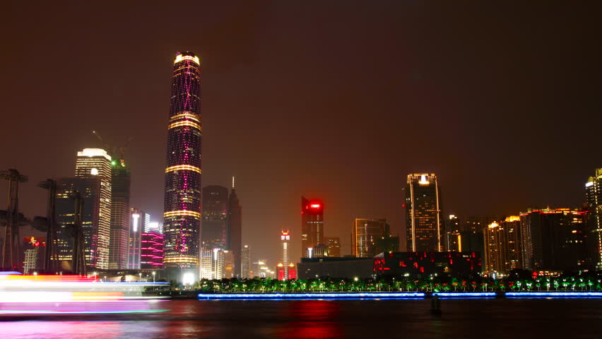 Time lapse of Guangzhou skyline over Pearl River at night on May 12, 2012 in
