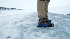 Foot walking on snow mountain in winter, trekking recreation pursuit, winter outdoor sport