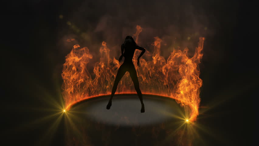 Woman posing infront of fire with Camera move.