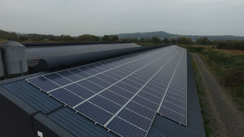 4K Aerial drone footage of large installation of solar panels in the countryside | Shutterstock HD Video #25489799