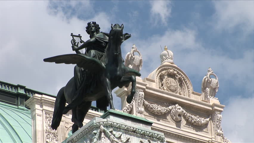 Close view of the statue in front of the Vienna opera house as seen on a nice day