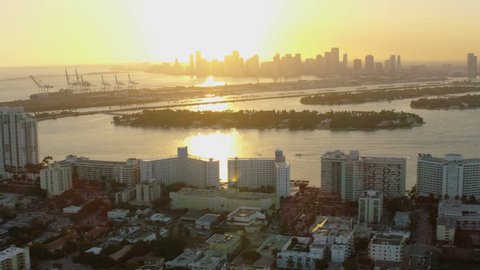 Aerial sunset view of Star Island MacArthur Causeway Waterfront Condominiums South Beach Resort Biscayne Bay Miami Florida USA