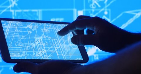 Industry development design blueprint plans on tablet computer.