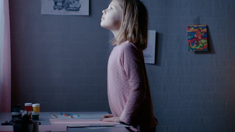 Curious Little Girl in Her Bedroom Runs Toward Window and Looks Out on Tiptoe. Shot on RED EPIC-W 8K Helium Cinema Camera.