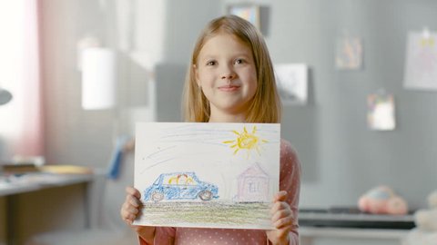 Cute Little Girl in Her Room Shows Drawing of Her Family in a Car. Shot on RED EPIC-W 8K Helium Cinema Camera.