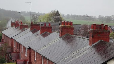 Terraced House Roofs In Rain.