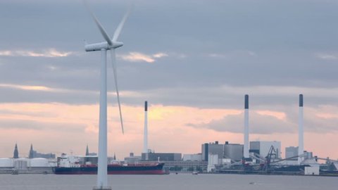 Windmill for electric energy generation in sea near coastal factory