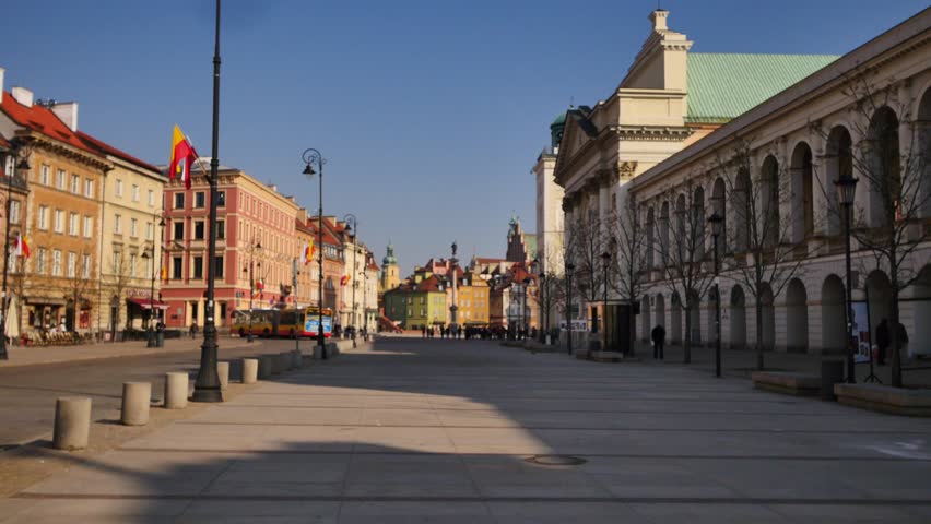 Old Town in Warsaw, capitol of Poland. Old, colorful  tenement houses. Smooth, dynamic scene recorded with gimbal,  March 2017 