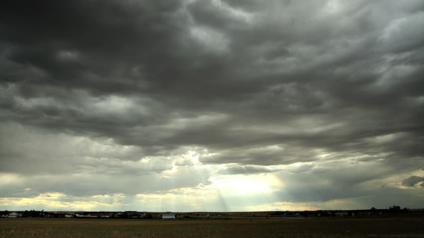 Storm clouds move in front of the evening summer sun in Deer Trail, Colorado. HD
