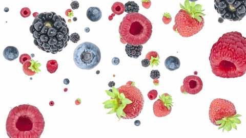 Mixed berries falling down on white background