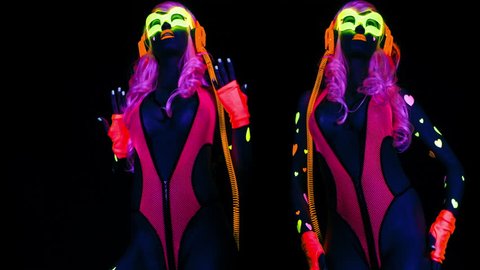 4k fantastic video of sexy cyber raver woman filmed in fluorescent clothing under UV black light.