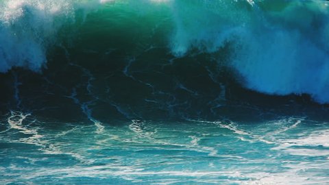 Big sea wave slow motion. Blue water of Pacific ocean crashing. Pipeline surfing wave swell. Beautiful sea water spray splash. Scenic coast rush force. Summer beach nature. Huge ocean wave break point