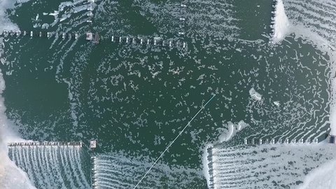 Shrimp Farm Pool with Oxygen Aeration System. View from Above. Phang Nga, Thailand. HD Slowmotion.