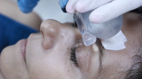Woman under facial spa anti aging procedure cosmetic treatment with injection in a clinic