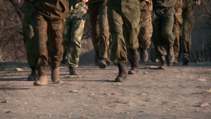 Soldiers training runs on the road. The boots only. Royalty-Free Stock Footage #25590752
