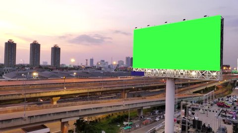 Green screen of advertising billboard and traffic on expressway of twilight in Bangkok, Thailand. time lapse.