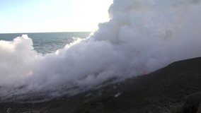View Of Steam Cloud As Hot Lava Meets The Ocean - Powered by Shutterstock - Get 15% off with code: PIKWIZARD15