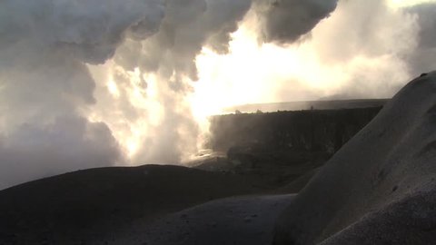 Ground Level View of Volcanic Landscape and Erupting Steam Cloud