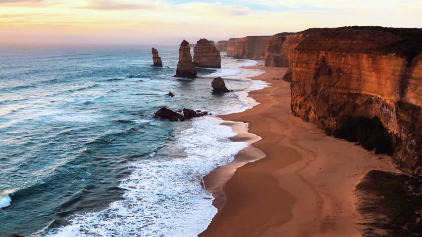 4k cinematic b-roll footage of rock formation along the coastline, The Twelve Apostles at Great Ocean Road, Australia during beautiful sunset. 