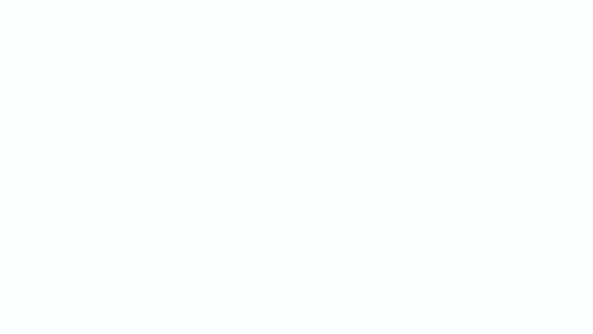 Happy excited young woman with long red hair jumping out with hands raised and making a surprise over white