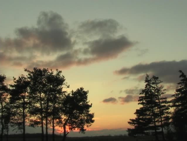 FADING SUN IN AN AUTUMN SKY