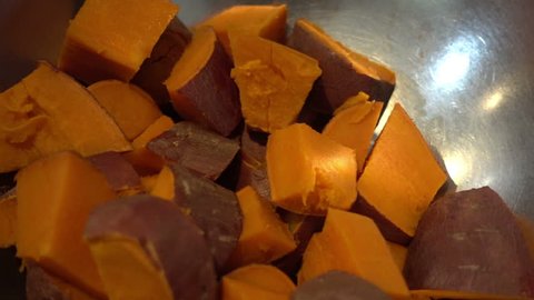 Yams or sweet potatoes in pan