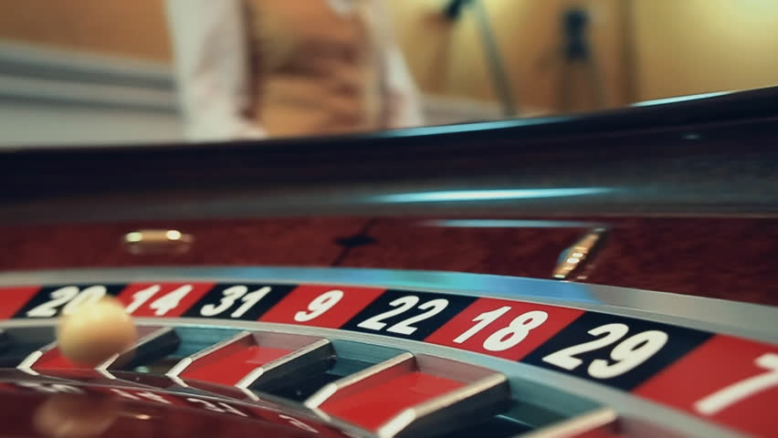 Image with a casino roulette wheel with the ball on number | Shutterstock HD Video #25633364