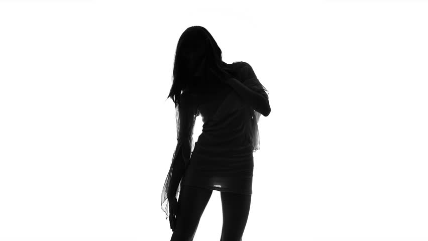Sexy silhouette of young woman on white background. Black and white | Shutterstock HD Video #25638587