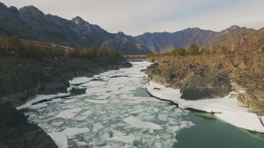 Ice on a mountain river, aerial view