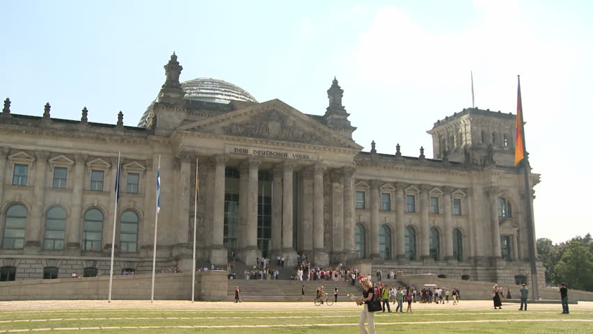 BERLIN, GERMANY - JULY 1:  Reichstag on a sunny day with tourists visiting and