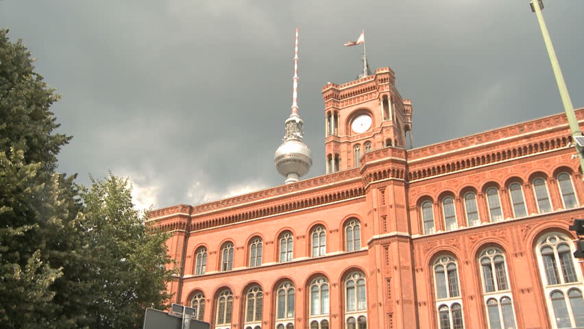 Television Tower behind the red town hall (Rotes Rathaus) in Berlin, Germany.