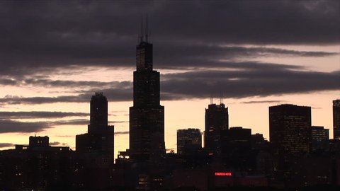 Chicago, IL - CIRCA September, 2007: Wide shot of the skyline silhouetted at dusk