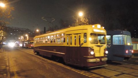 MOSCOW - APRIL 07, 2017: Retro tramways drive in Moscow on Shabolovka street, tramways parade night rehearsal. Color video.