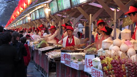 BEIJING, CHINA - CIRCA MAY 2011: Wangfujing Street, Snack Street Market selling traditional food