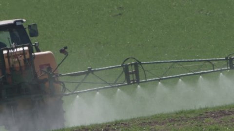 farmer spraying roundup